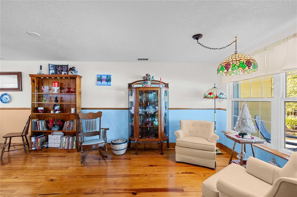 1109 Commodore Street Clearwater, FL 33755 - Photo 15 of 42 a living room with furniture and a window