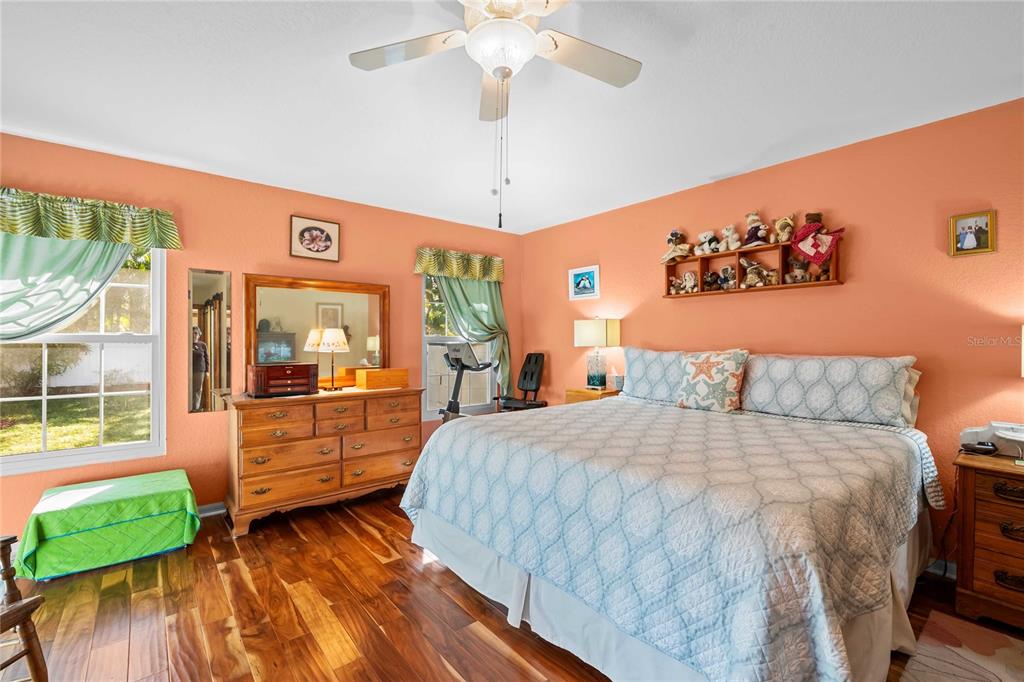 1109 Commodore Street Clearwater, FL 33755 - Photo 18 of 42 a bedroom with a bed and a dresser