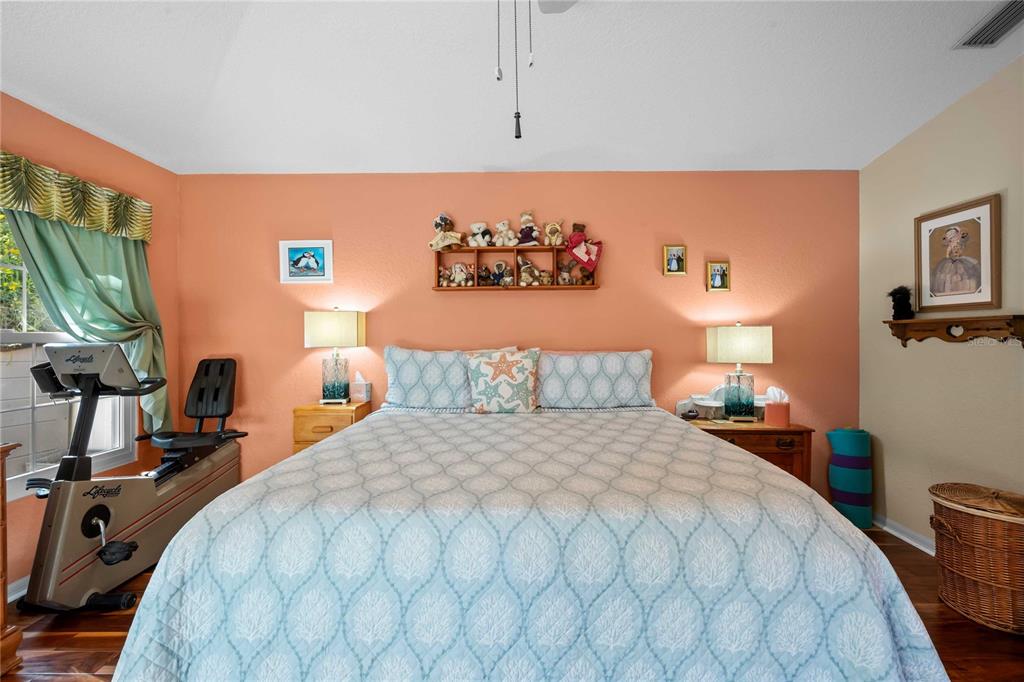 1109 Commodore Street Clearwater, FL 33755 - Photo 19 of 42 a bedroom with a bed and a desk