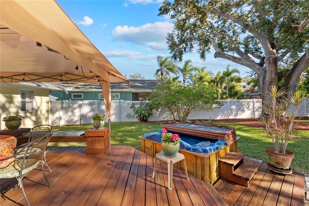 1109 Commodore Street Clearwater, FL 33755 - Photo 37 of 42 a view of yard with patio