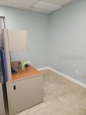 14920 Balm Wimauma Road Wimauma, FL 33598 - Photo 15 of 20 a room with cabinets and refrigerator