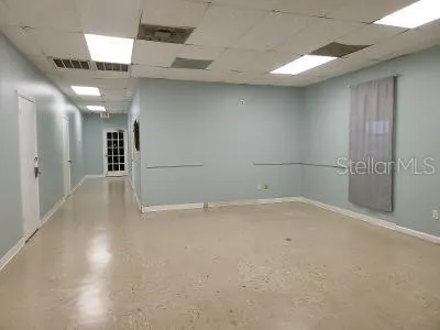an empty room with windows