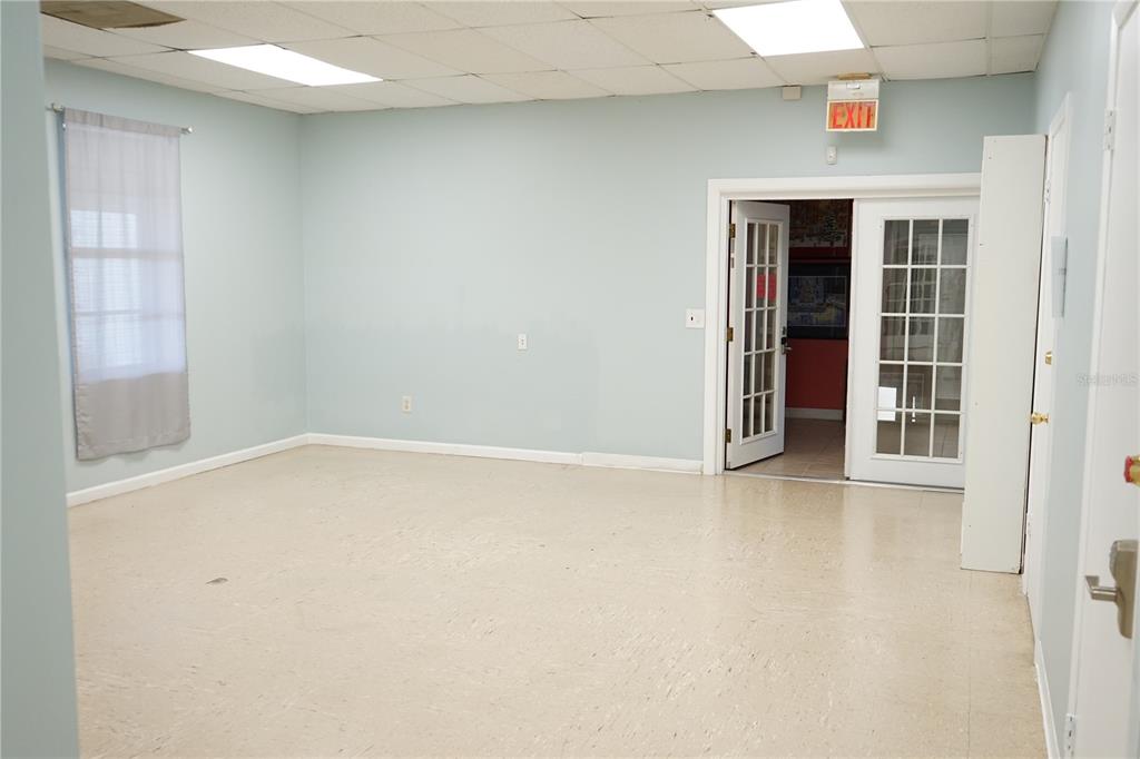 14920 Balm Wimauma Road Wimauma, FL 33598 - Photo 9 of 20 an empty room with windows