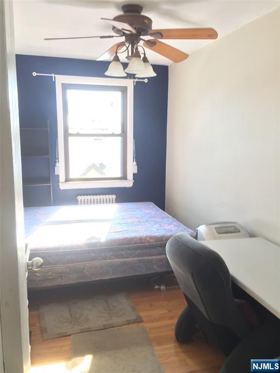 418 Main Street, Unit D6 Fort Lee, NJ 07024 - Photo 5 of 7 a bathroom with a sink and a window