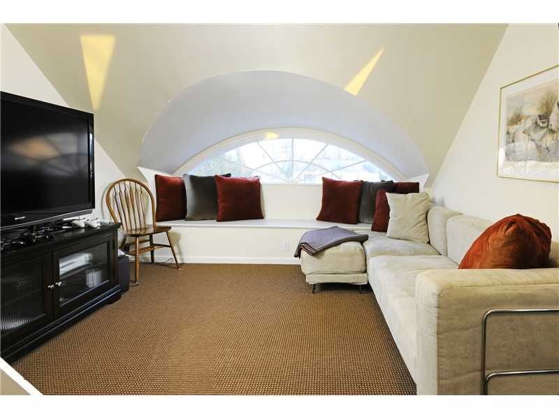 Undisclosed Address Riverside, CT 06878 - Photo 15 of 19 a living room with furniture and a flat screen tv