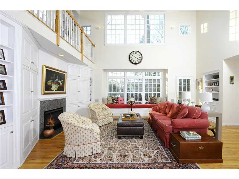 Undisclosed Address Riverside, CT 06878 - Photo 4 of 19 a living room with furniture and a large window