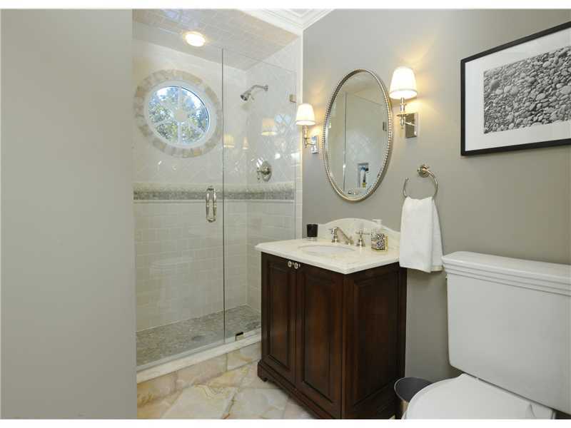 Undisclosed Address Riverside, CT 06878 - Photo 9 of 19 a bathroom with a sink mirror and shower