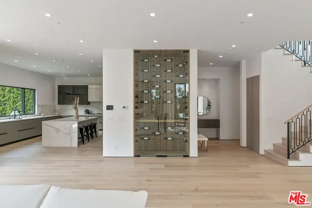 a view of a kitchen with furniture and window