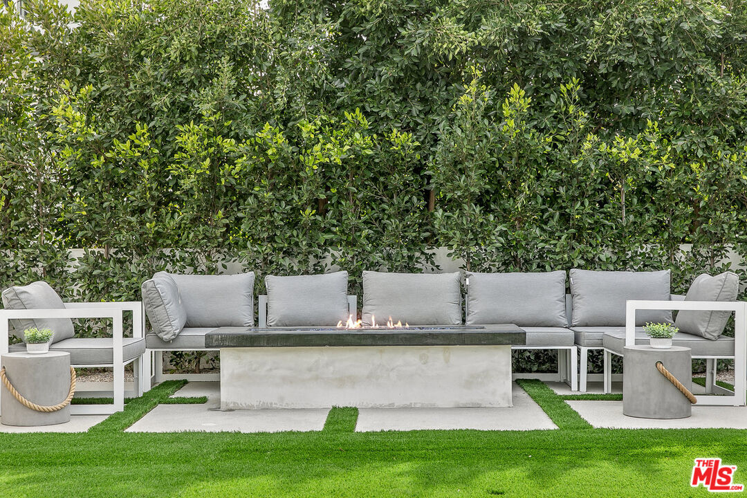 211 Veteran Avenue Los Angeles, CA 90024 - Photo 22 of 51 a view of house with a yard and sitting area