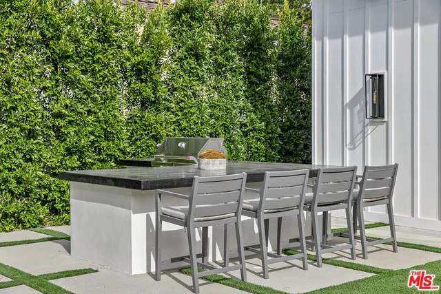 a view of swimming pool with a yard