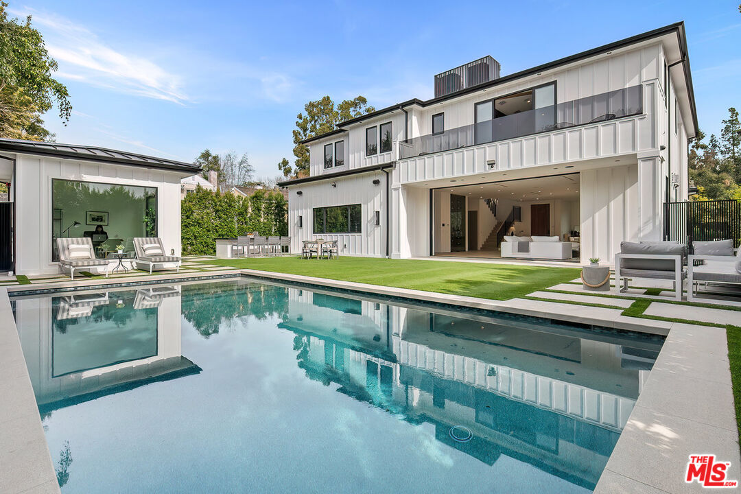 211 Veteran Avenue Los Angeles, CA 90024 - Photo 4 of 51 a view of house with swimming pool and outdoor seating