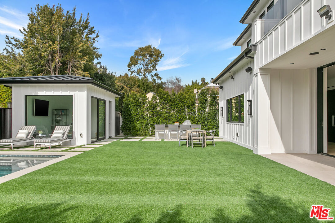 211 Veteran Avenue Los Angeles, CA 90024 - Photo 50 of 51 a view of a house with backyard and sitting area