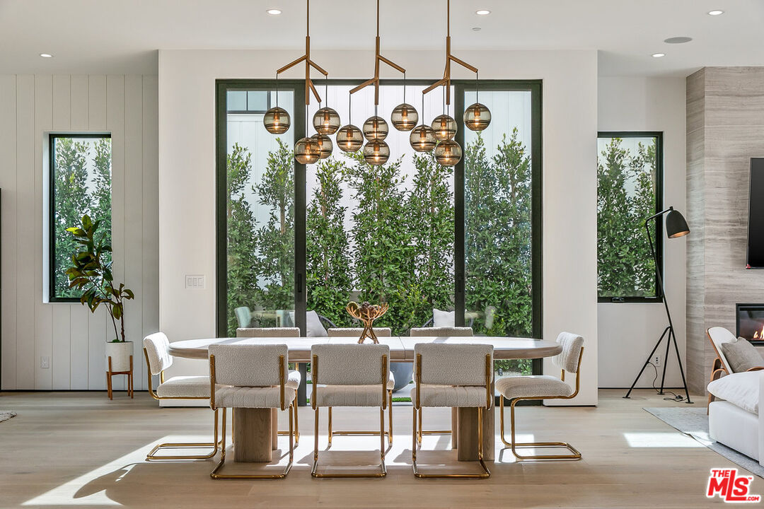 211 Veteran Avenue Los Angeles, CA 90024 - Photo 10 of 51 a view of a dining room with furniture window and outside view
