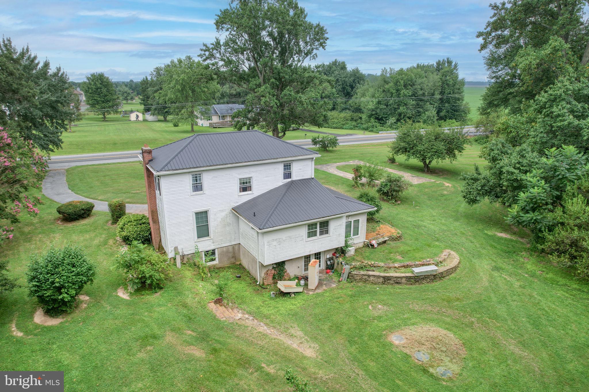 5321 Millington Road Clayton, DE 19938 - Photo 15 of 44 a aerial view of a house with a yard