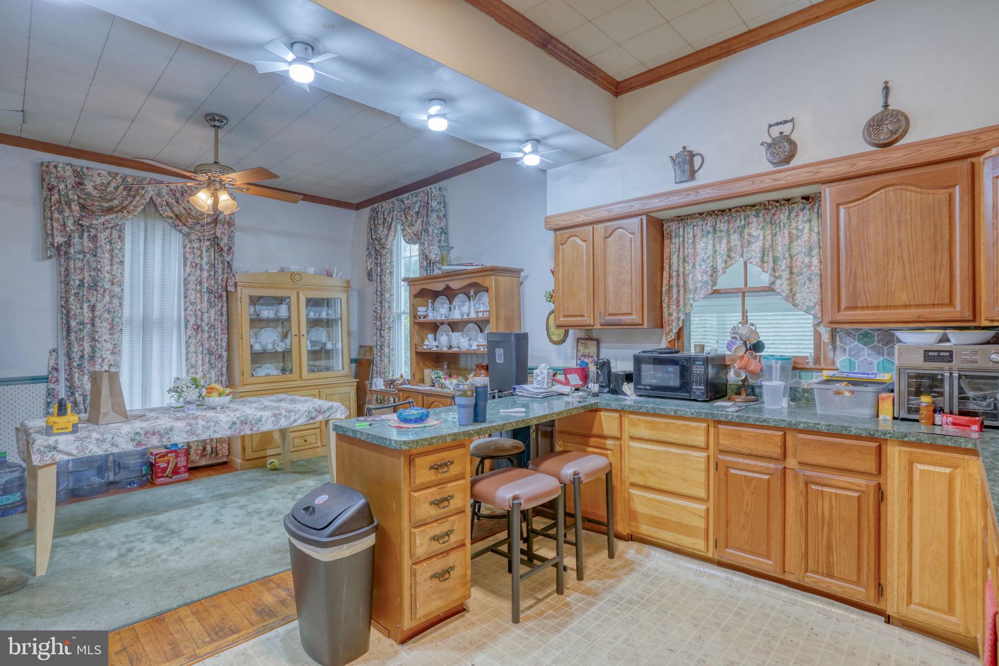 5321 Millington Road Clayton, DE 19938 - Photo 30 of 44 a kitchen with sink cabinets and window