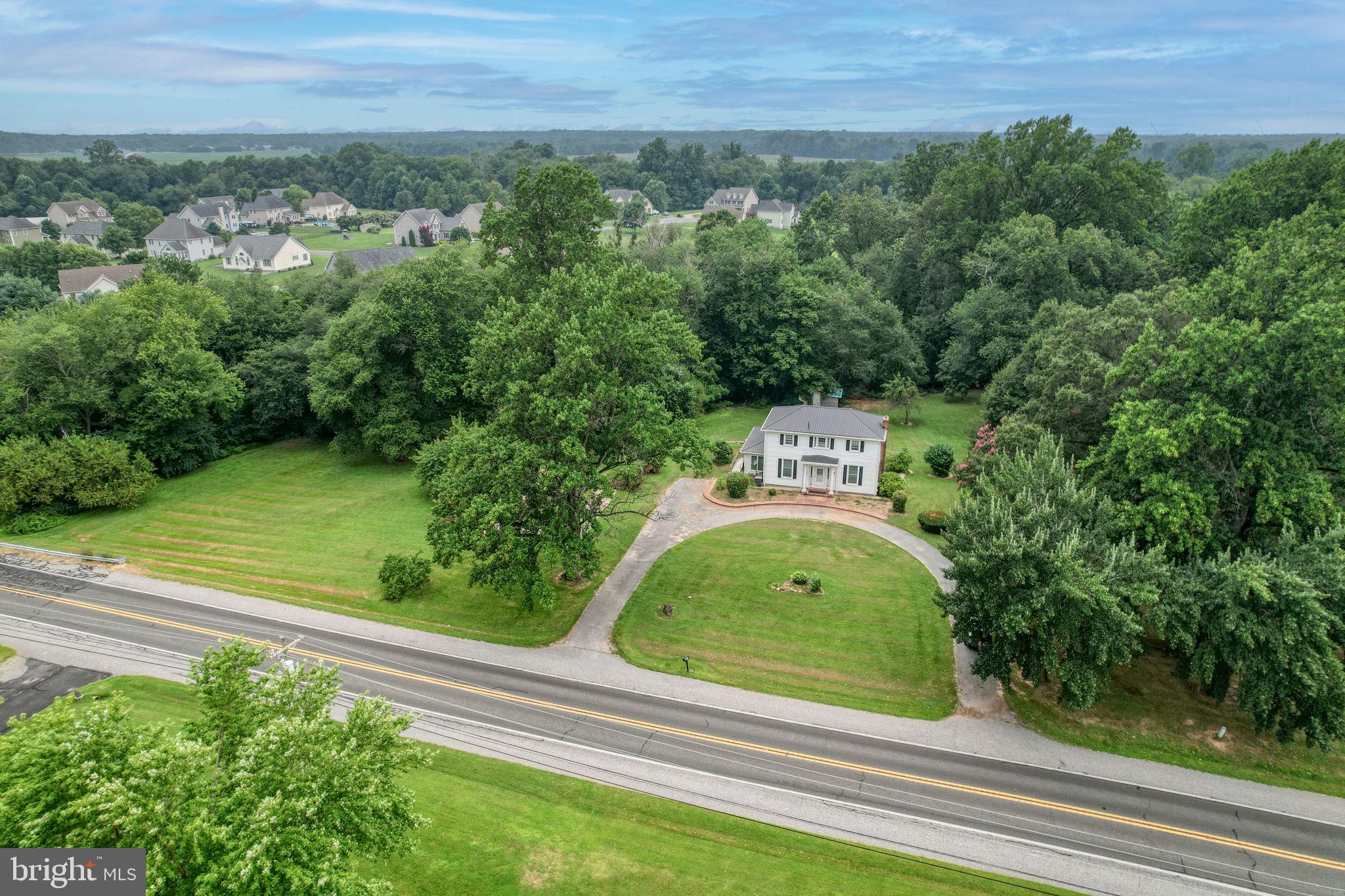 5321 Millington Road Clayton, DE 19938 - Photo 4 of 44 an aerial view of a house