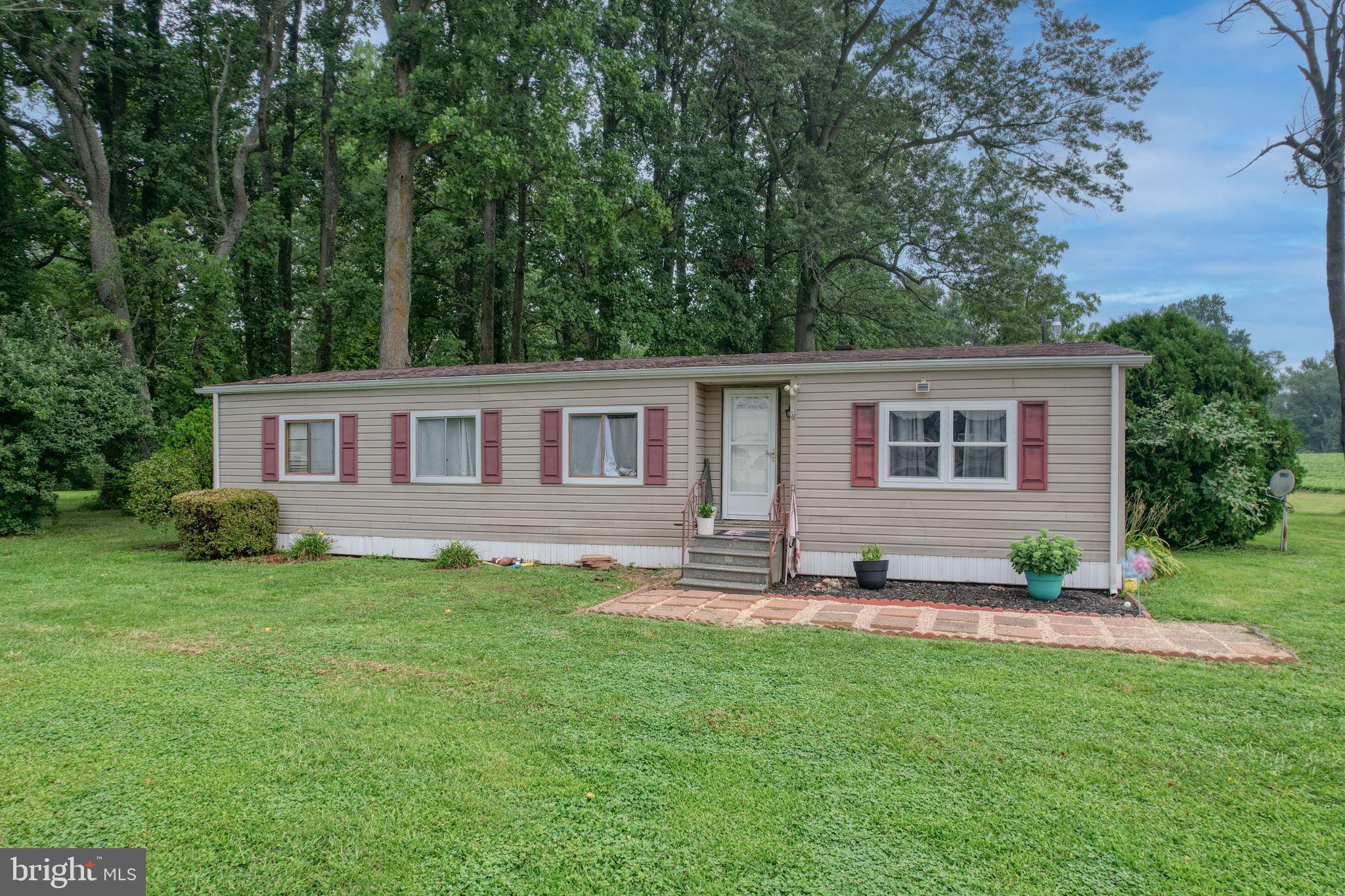 5321 Millington Road Clayton, DE 19938 - Photo 10 of 44 a view of a house with a yard
