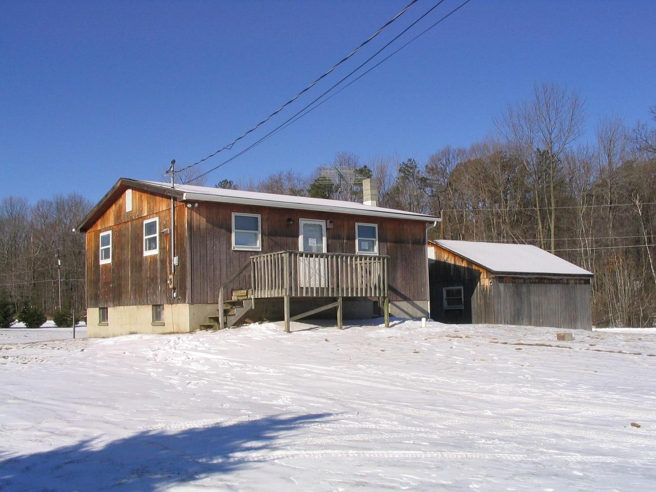 8122 Cays Road Stroudsburg, PA 18360 - Photo 3 of 3 a view of a house with snow in the background