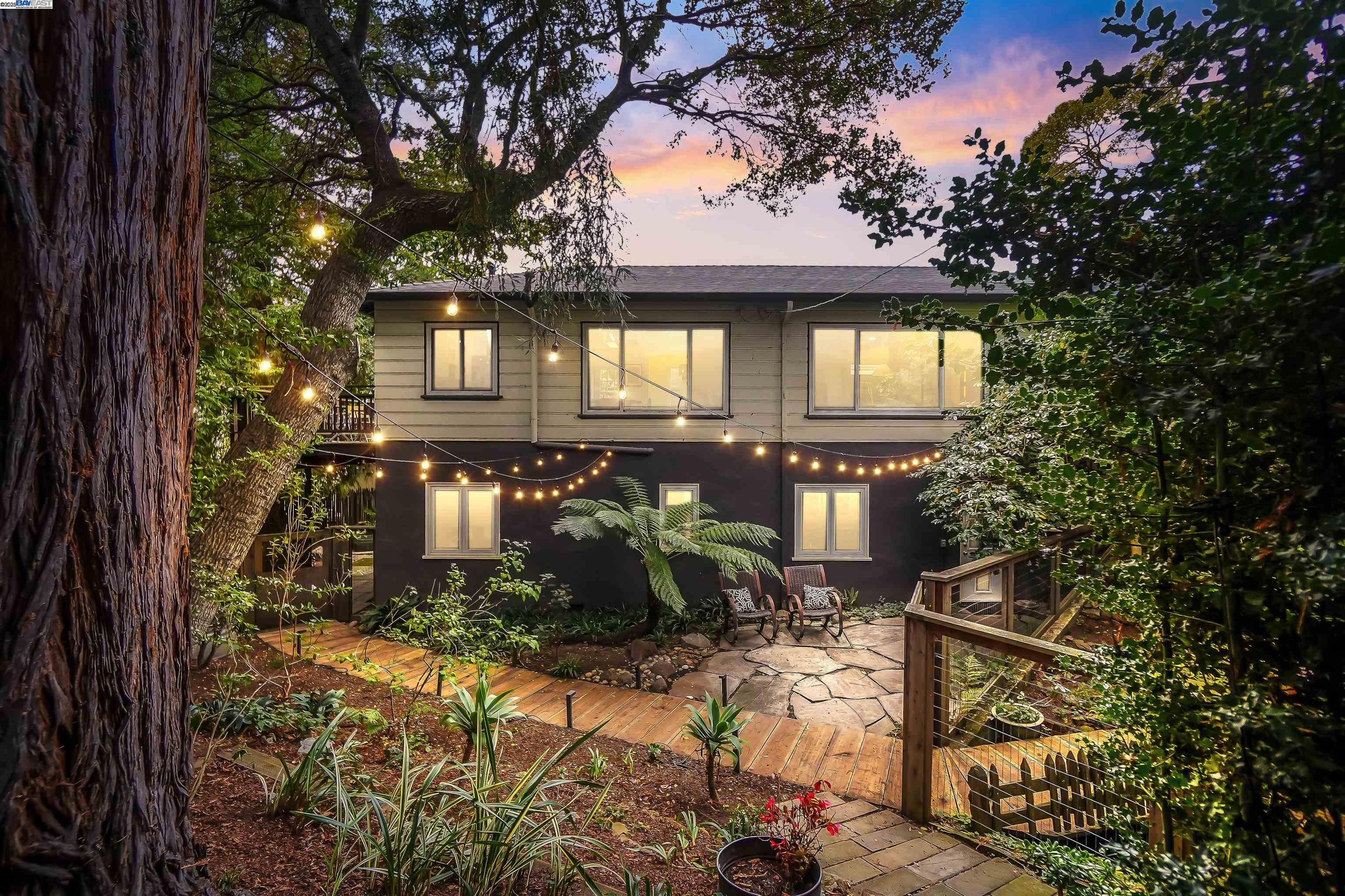 a front view of a house with yard