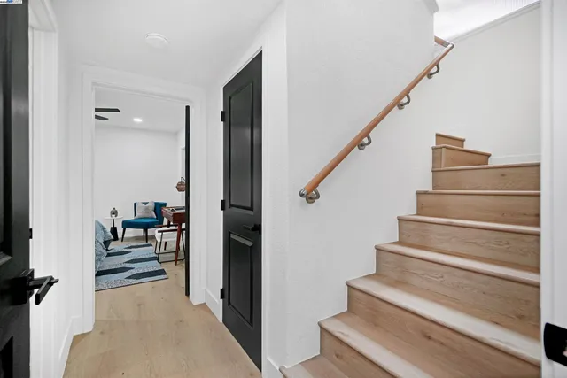 a living room with furniture and flat screen tv