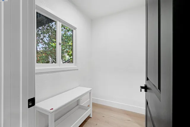 a view of a chairs and table in the balcony