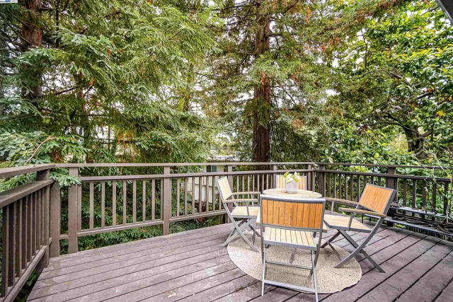 a view of a balcony with chairs