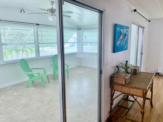 808 South Silver Circle Key Largo, FL 33037 - Photo 12 of 50 a view of a dining room with furniture and a window