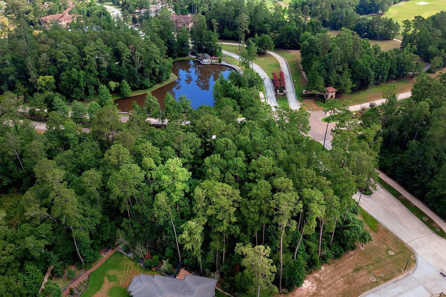 67 North Glenwild Circle Spring, TX 77389 - Photo 3 of 10 a view of a house with a yard and balcony