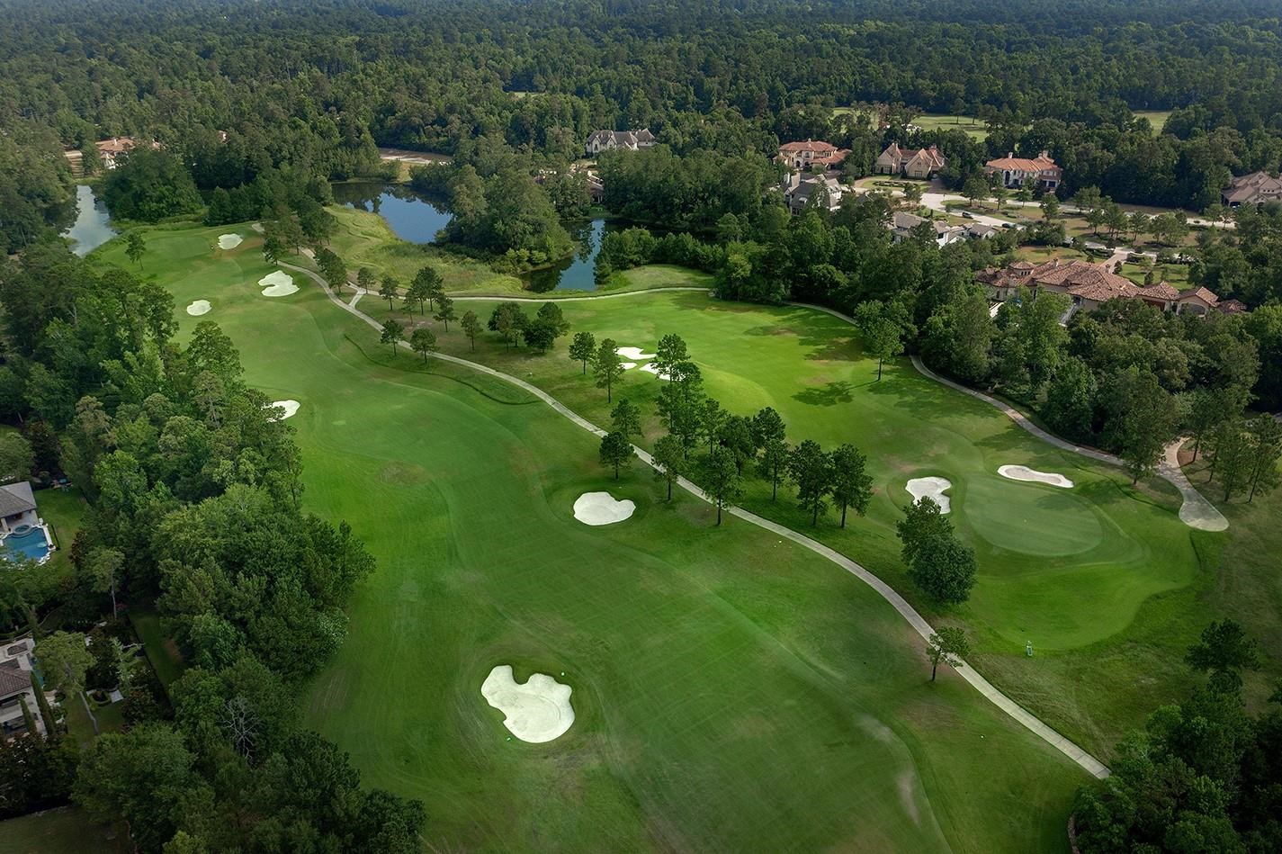 67 North Glenwild Circle Spring, TX 77389 - Photo 9 of 10 a view of a golf course with a tree