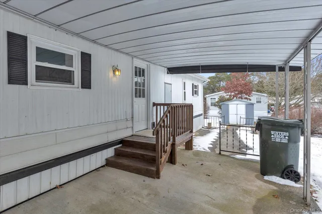 a view of a porch with furniture