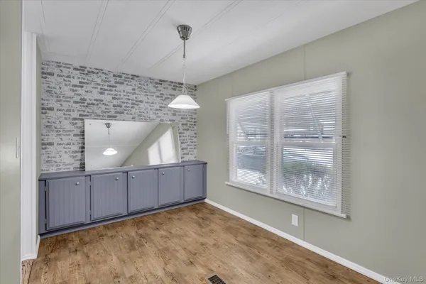 a view of a room and window