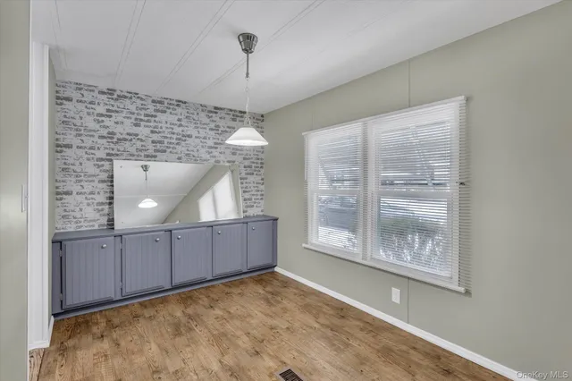 a view of a room and window