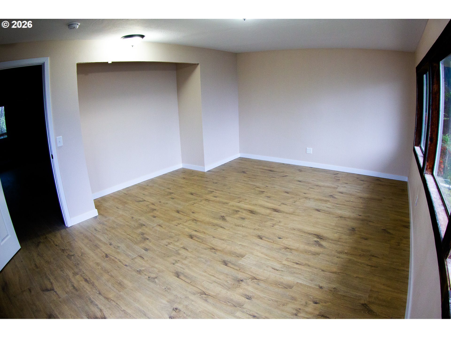 411 Upper Terrace Lane Glide, OR 97443 - Photo 13 of 25 a view of empty room with wooden floor