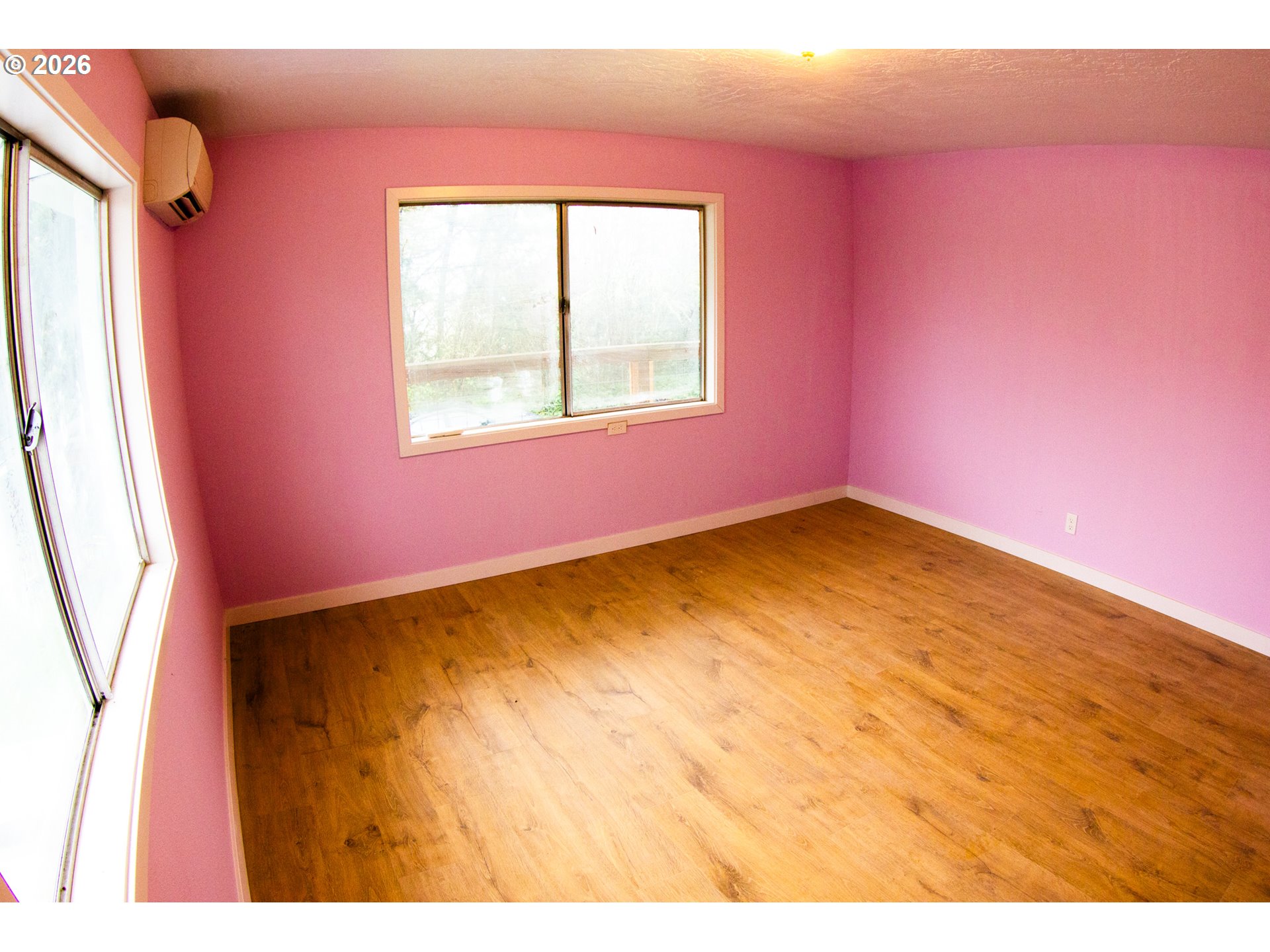 411 Upper Terrace Lane Glide, OR 97443 - Photo 19 of 25 a view of an empty room with a window