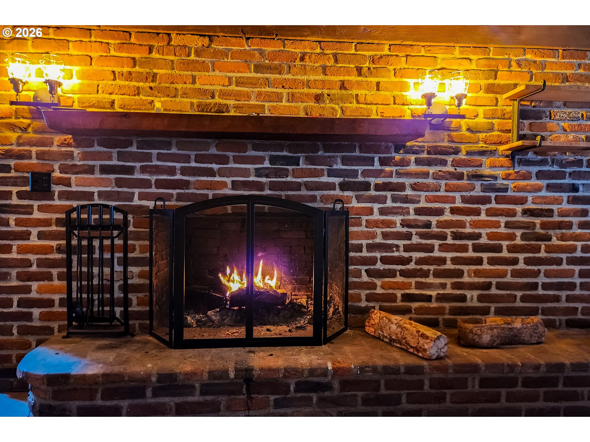 411 Upper Terrace Lane Glide, OR 97443 - Photo 6 of 25 a view of open area with a fireplace