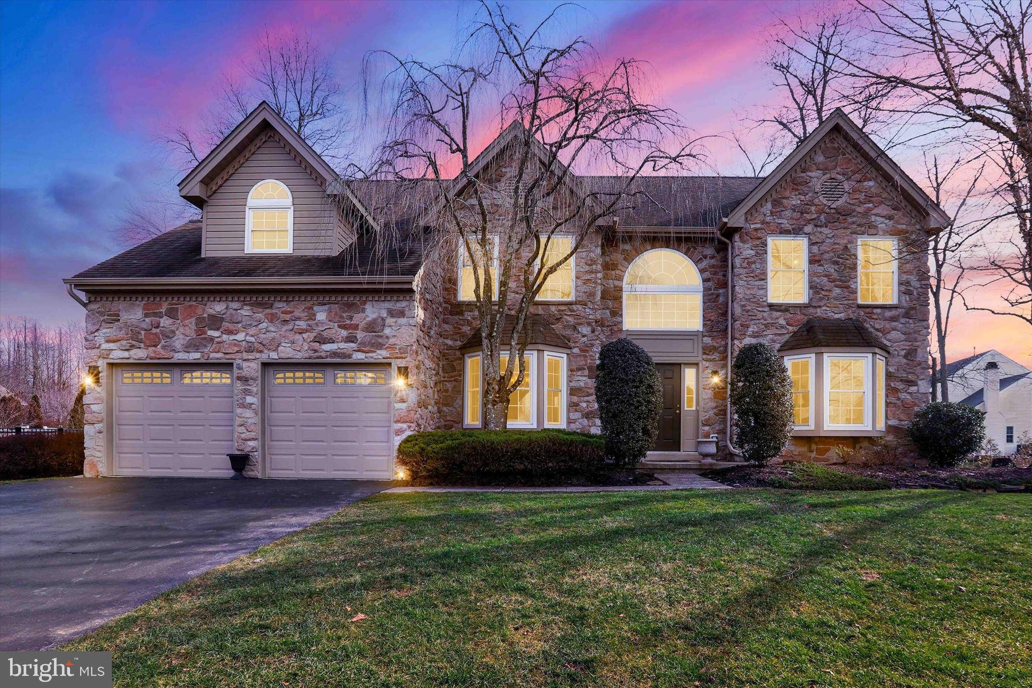 4901 Crosspoint Drive Doylestown, PA 18902 - Photo 3 of 73 Twilight Front Exterior With Stone Facade
