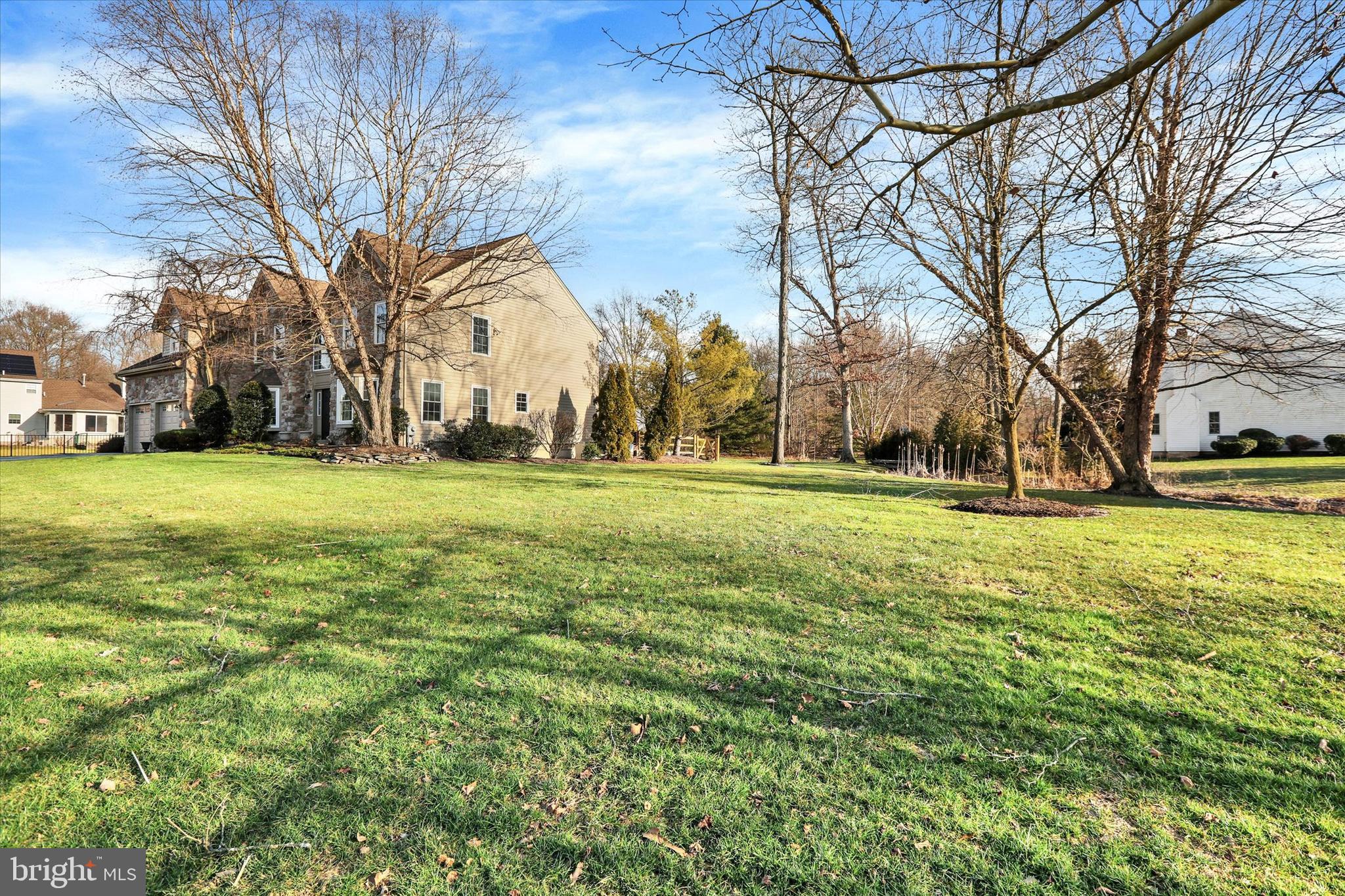 4901 Crosspoint Drive Doylestown, PA 18902 - Photo 7 of 73 Front Angled View Of Yard And Exterior