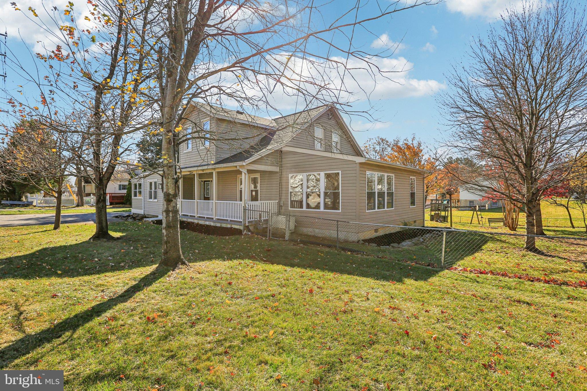 10571 Scaggsville Road Laurel, MD 20723 - Photo 41 of 60 a view of a yard with a house in the background