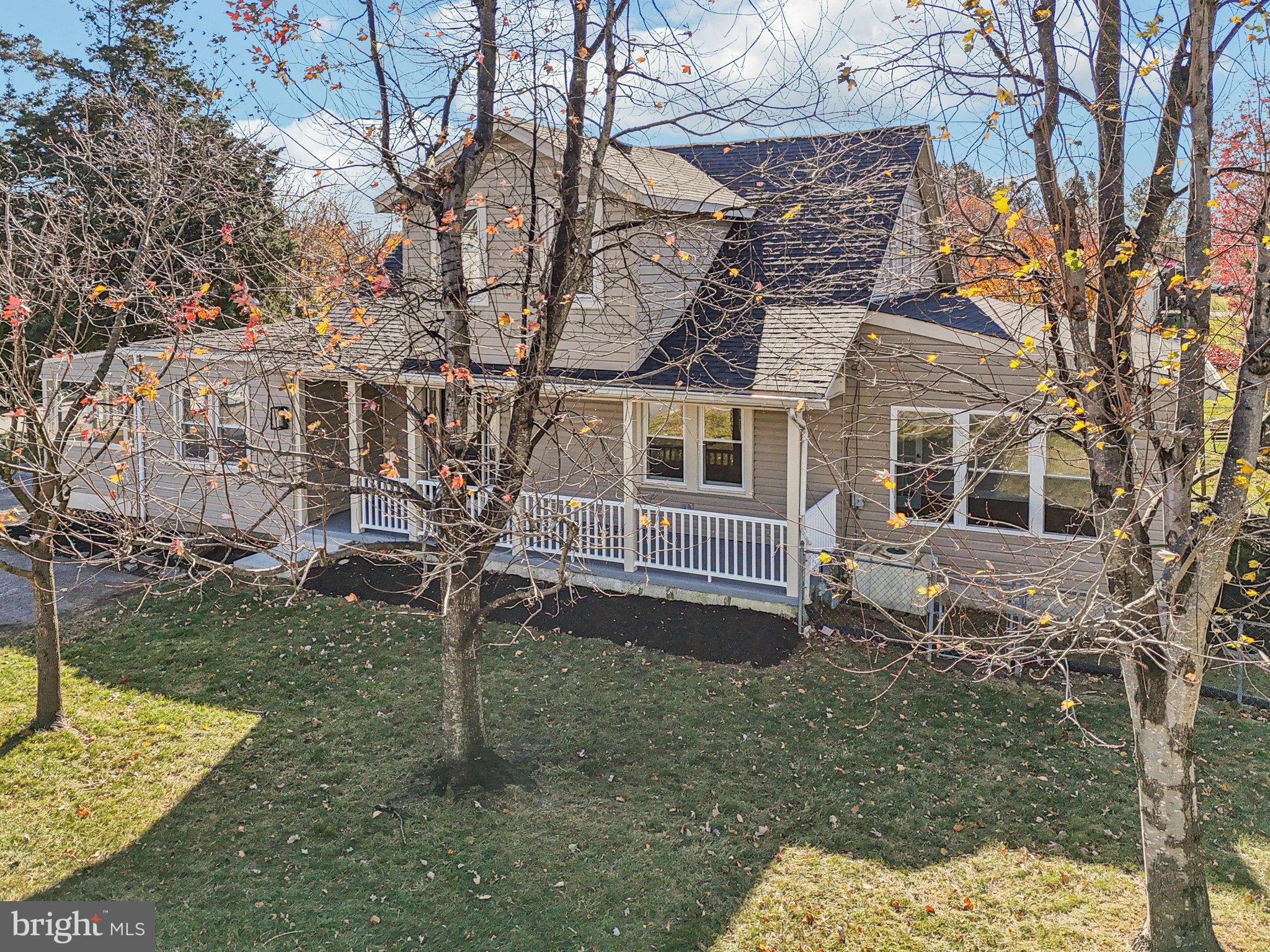 10571 Scaggsville Road Laurel, MD 20723 - Photo 45 of 60 a view of a house with a yard