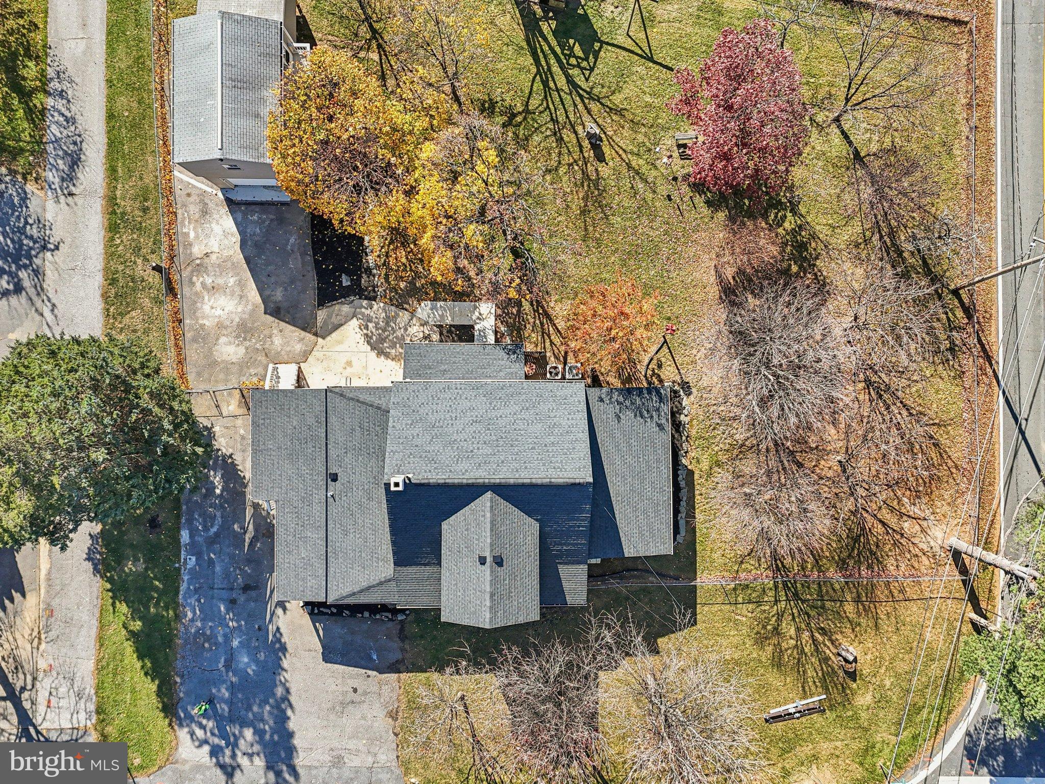 10571 Scaggsville Road Laurel, MD 20723 - Photo 47 of 60 a aerial view of a house with large trees