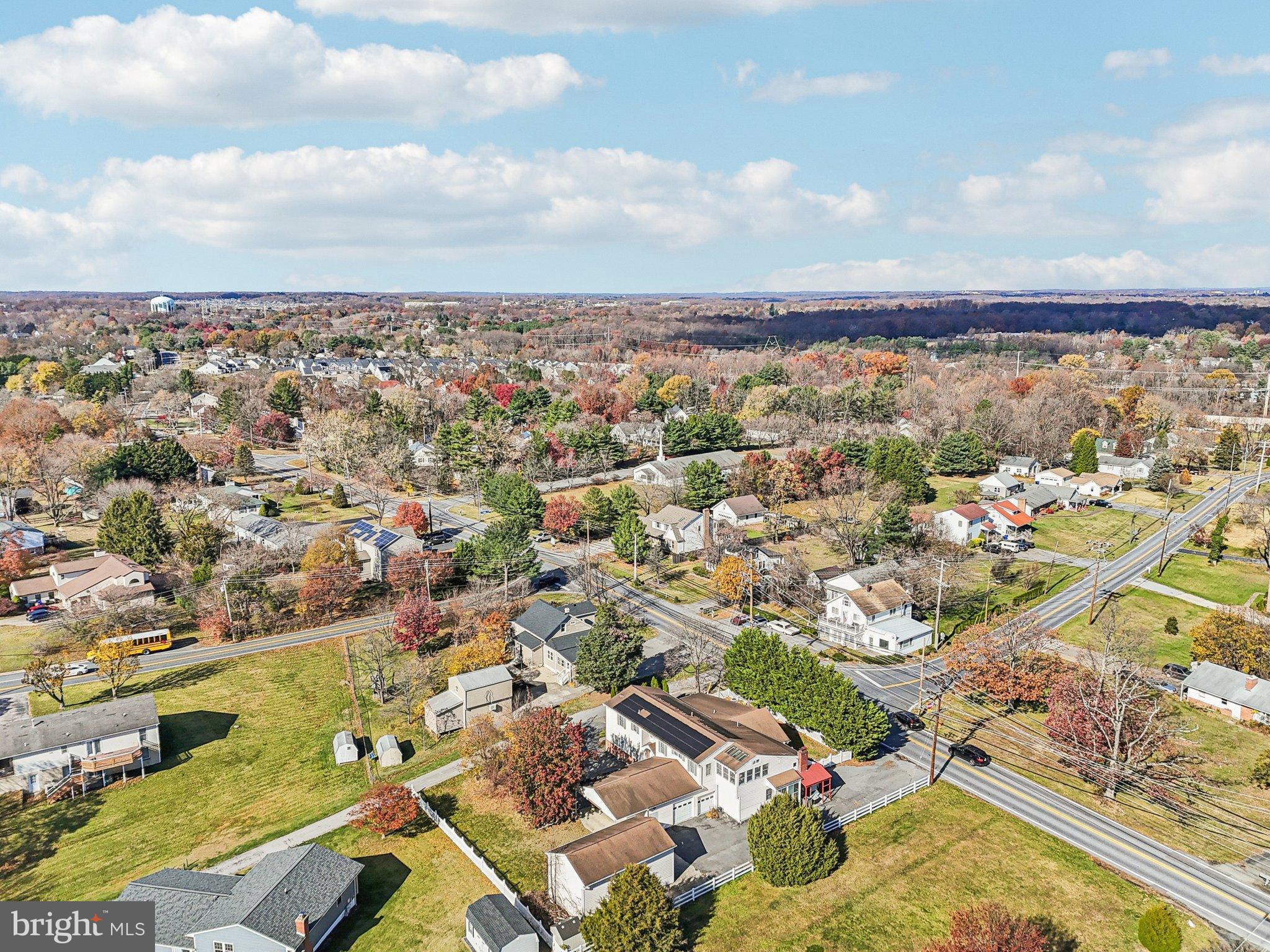 10571 Scaggsville Road Laurel, MD 20723 - Photo 51 of 60 an aerial view of residential building and car parked