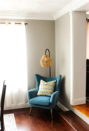 a living room with furniture and a window
