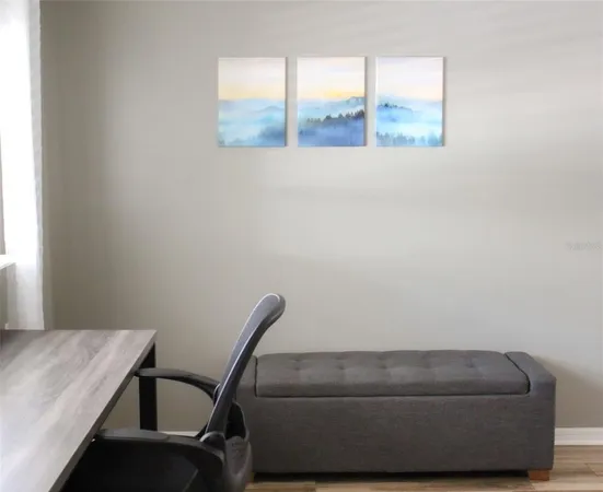 a living room with a couch and a window