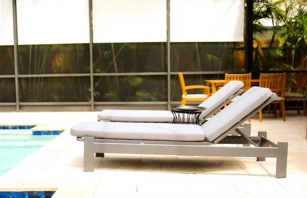 a view of a bench in a backyard