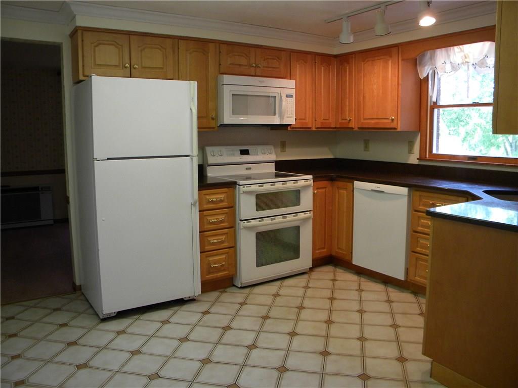 208 Springdale Road Venetia, PA 15367 - Photo 4 of 25 Bosch dishwasher, Maytag glass top electric stove and double oven, Maytag refrigerator and Whirlpool microwave.