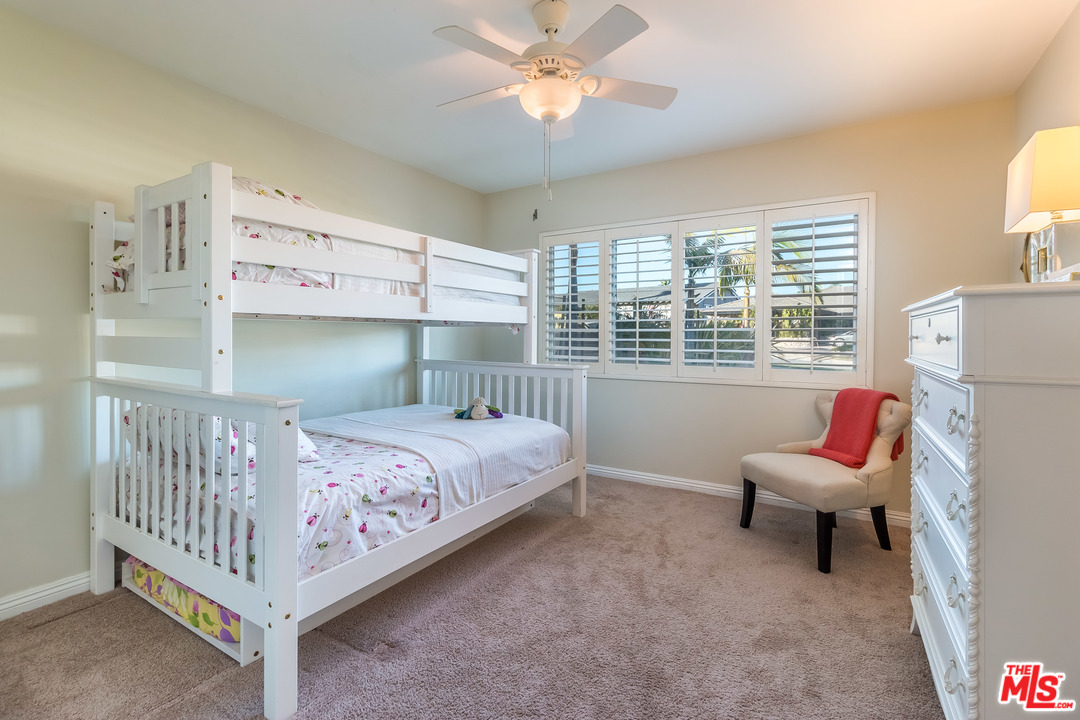 4304 Olympiad Drive View Park, CA 90043 - Photo 29 of 44 a bedroom with a bed and a window