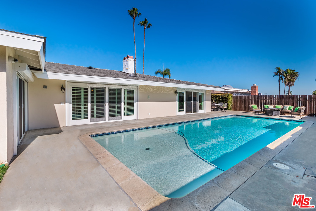 4304 Olympiad Drive View Park, CA 90043 - Photo 8 of 44 a front view of a house with a yard