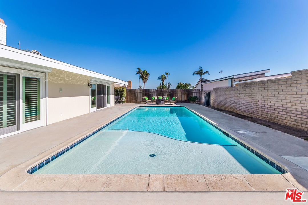 4304 Olympiad Drive View Park, CA 90043 - Photo 9 of 44 a view of a tennis ground with large windows