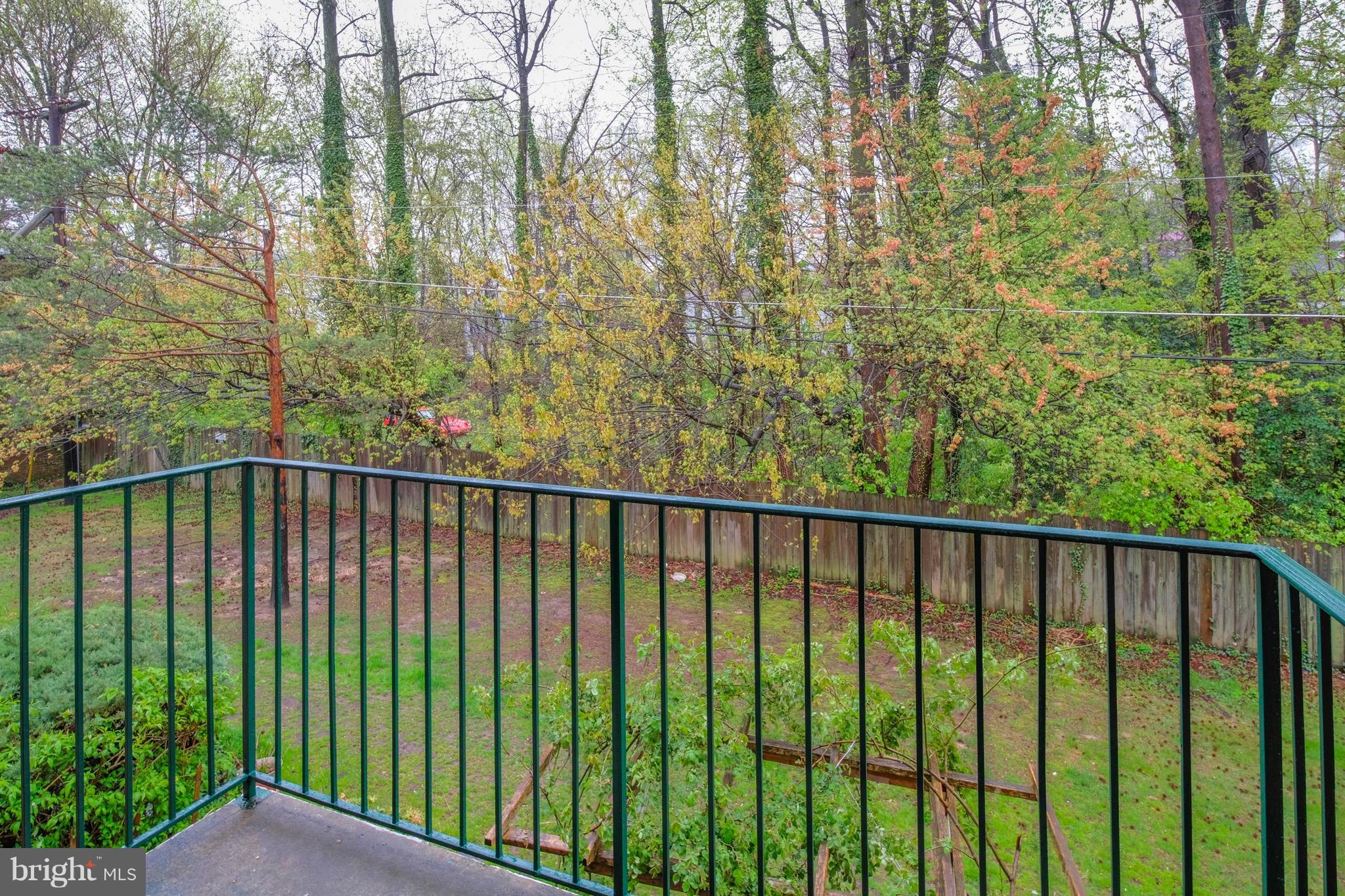 7092 Spring Garden Drive, Unit 102 Springfield, VA 22150 - Photo 8 of 10 Balcony off living room overlooks ample green!