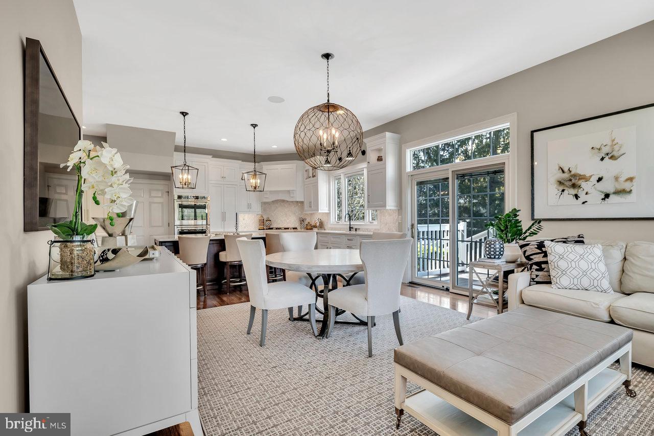 17 Banyan Road Skillman, NJ 08558 - Photo 20 of 53 a living room with furniture a table and a chandelier